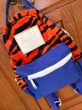 Herschel Supply Company Nova Mini Fuzzy Tiger Stripe Backpack. Orange Blue